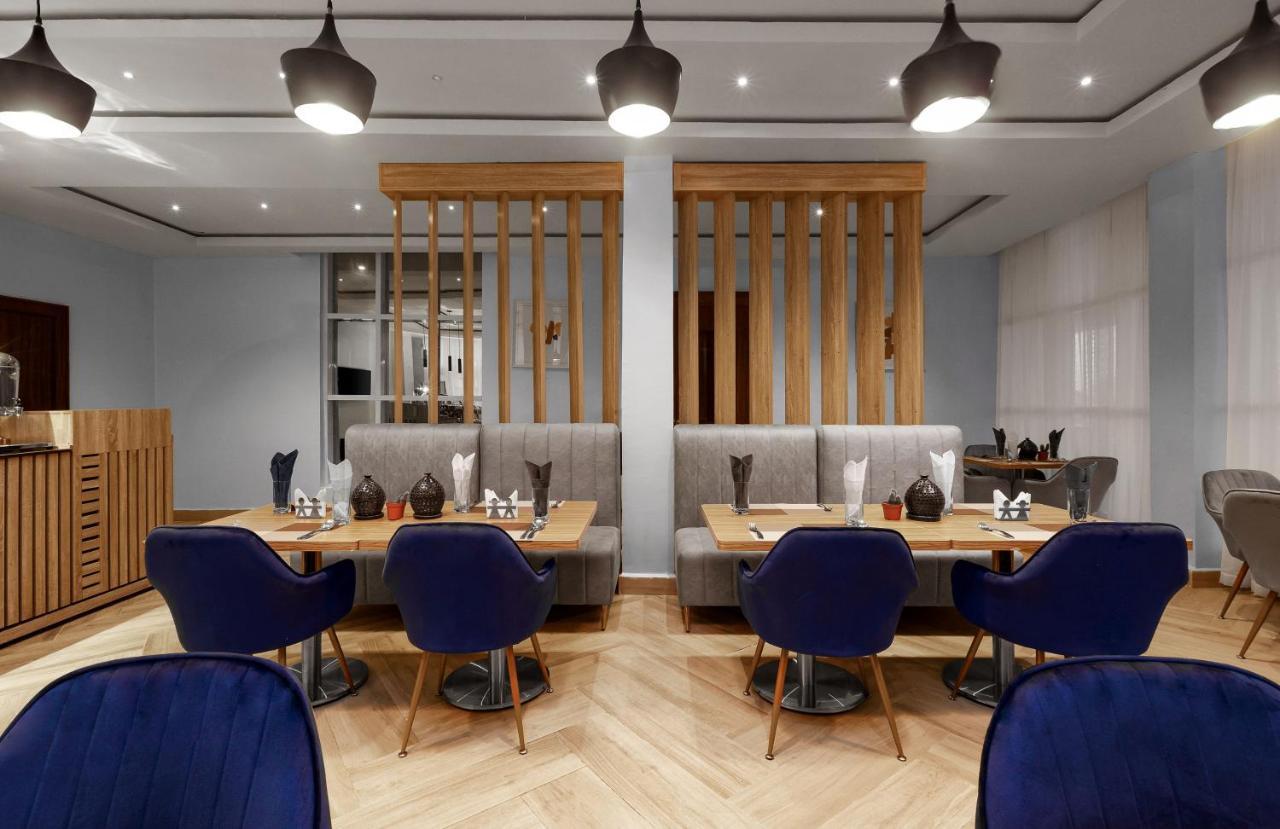 Aveon Hotel Абуджа Екстериор снимка